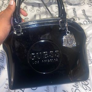 Guess black glossy purse